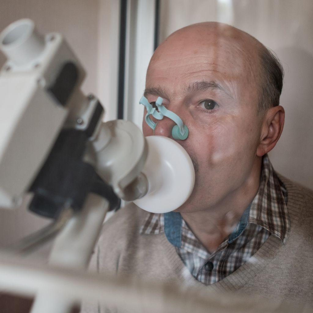 Employee undergoing spirometry or lung function test